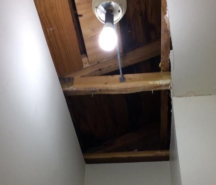 The closet ceiling that had been covered in mold was removed